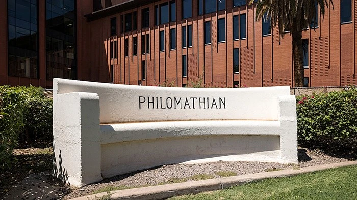 While stone bench with the word "Philomathian" etched on the front,  located on the Tempe campus