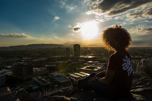 Student over looking ASU Tempe Campus as the sun sets.