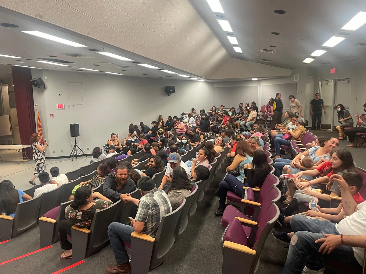 Photo of families gathered in an auditorium at Metro Tech High School In Phoenix, AZ