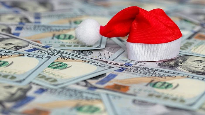 Santa hat sitting on money
