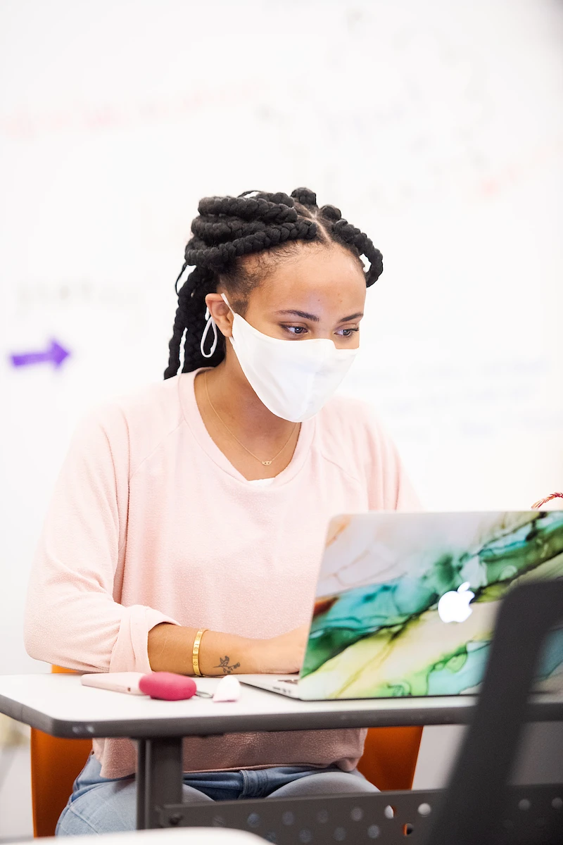 student at laptop